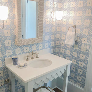 Bathroom by Becky Boyle with stitched weezie towels with embroidery in light blue in Perry 