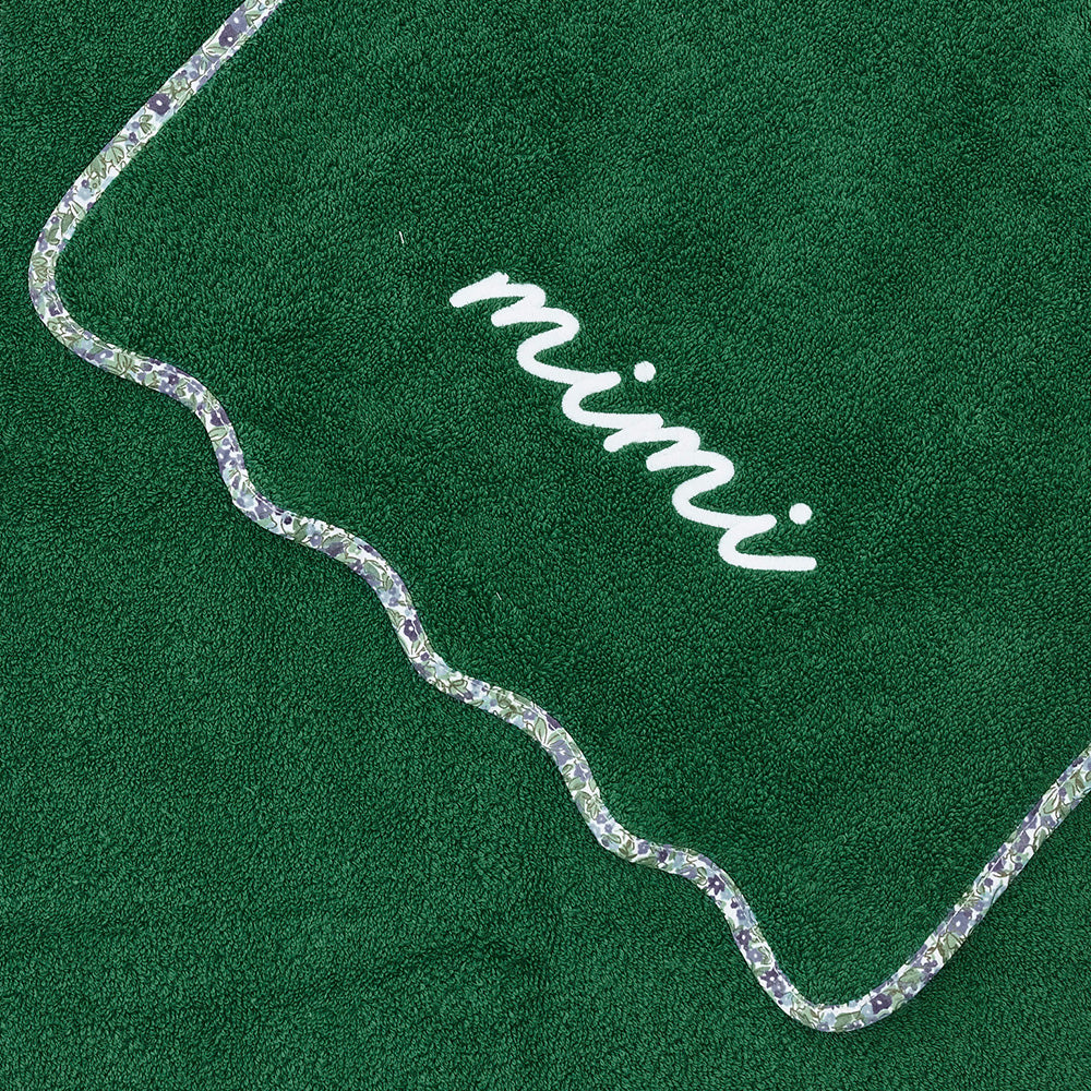 tennis towel and pickleball towel on tennis court