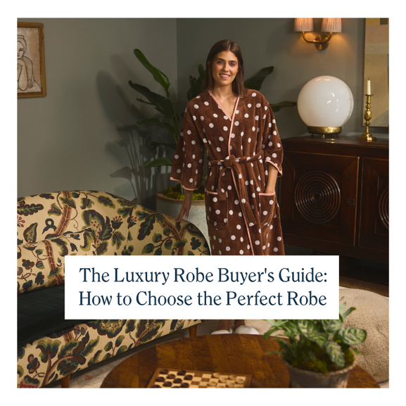 Woman in a brown polka dot robe behind a floral sofa with a buyer's guide text overlay.