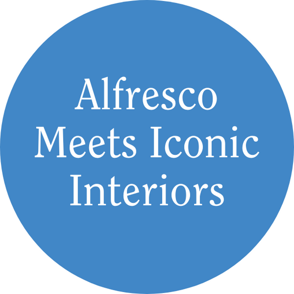 In blue background and white font "Alfresco Meetings Iconic Interiors"