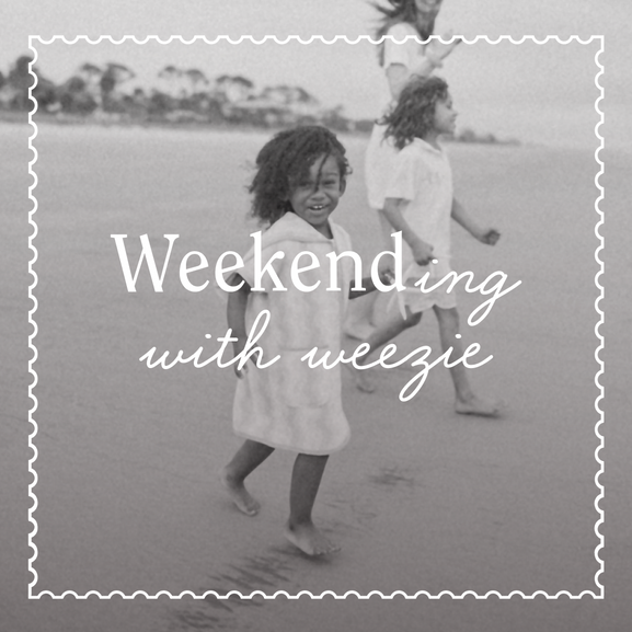 Weekending with Weezie. Children walk along the beach in matching cover-ups during a family weekend getaway.