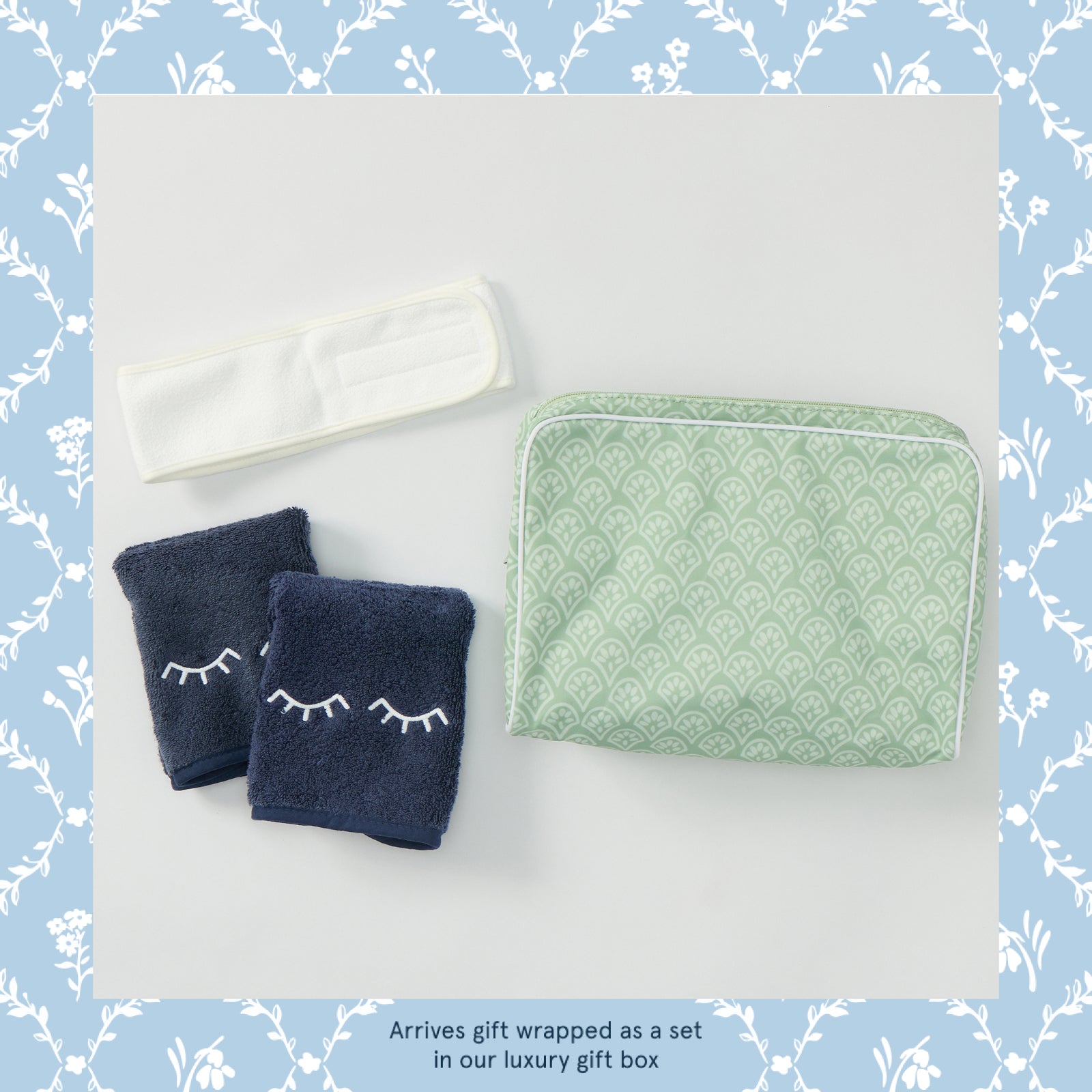 Beauty Set in Green Block Print, navy makeup towels, green vanity case and spa headband laid flat