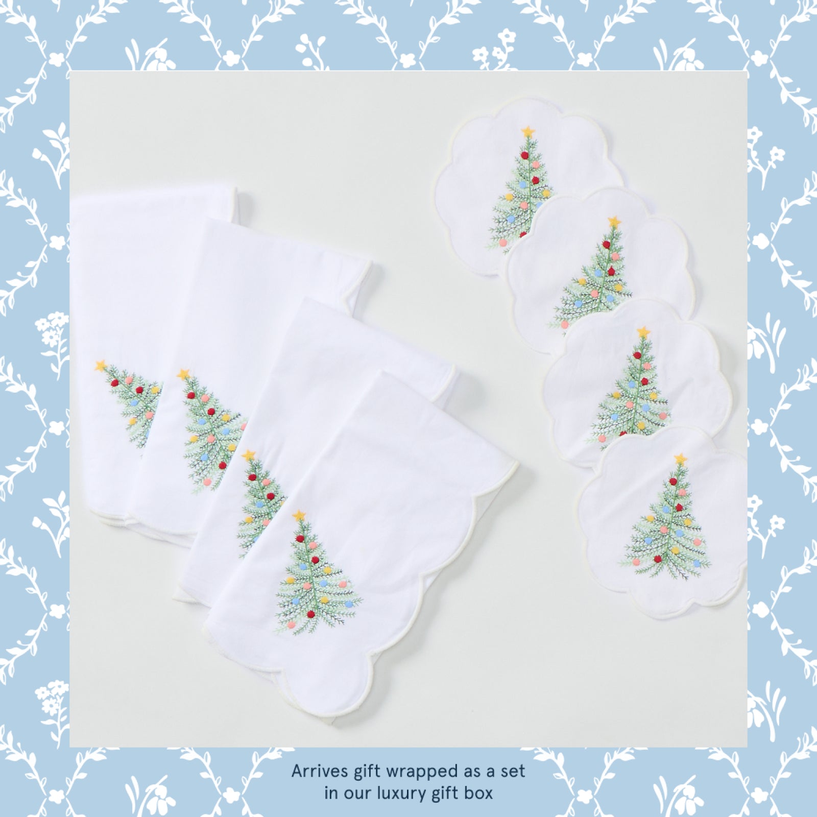 Cocktail and dinner napkin gift set in Holiday Tree, four dinner and four cocktail napkins laid flat