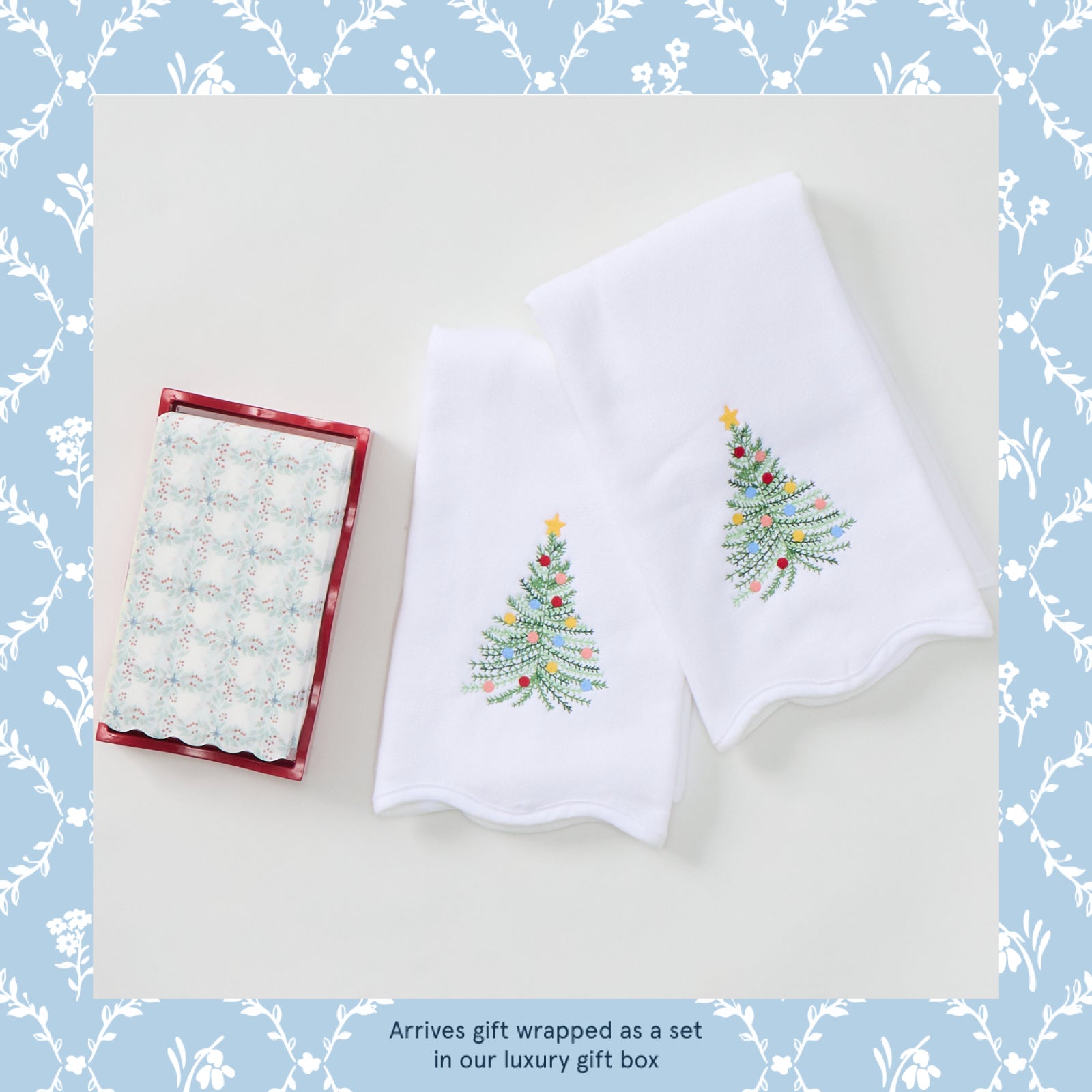 Holiday Bathroom Completers in Holiday Tree, two powder bath towels and a tissue box cover laid flat