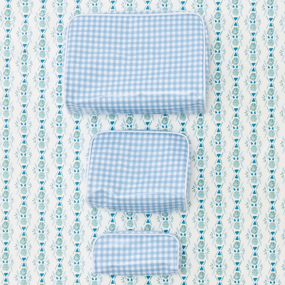 photo of the patterned toiletry bag trio (large, small, and medium) in Light Blue Gingham Archive