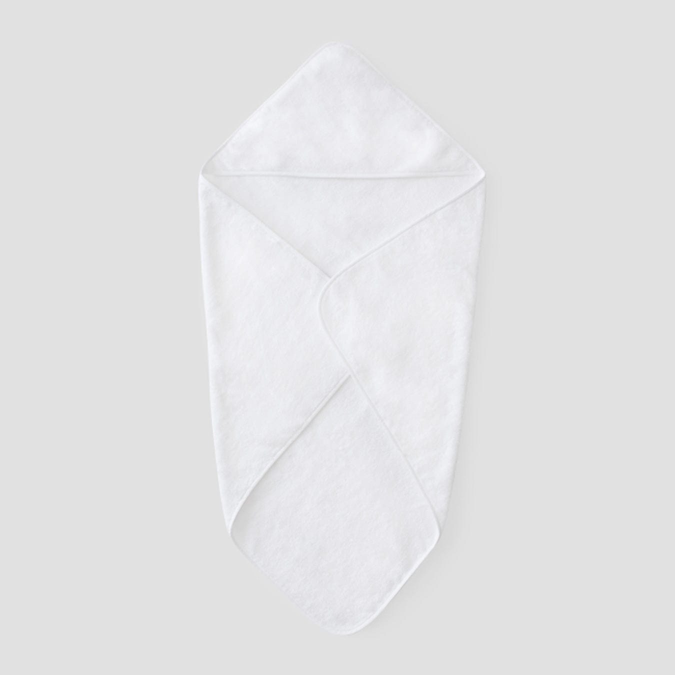 A white baby hooded towel